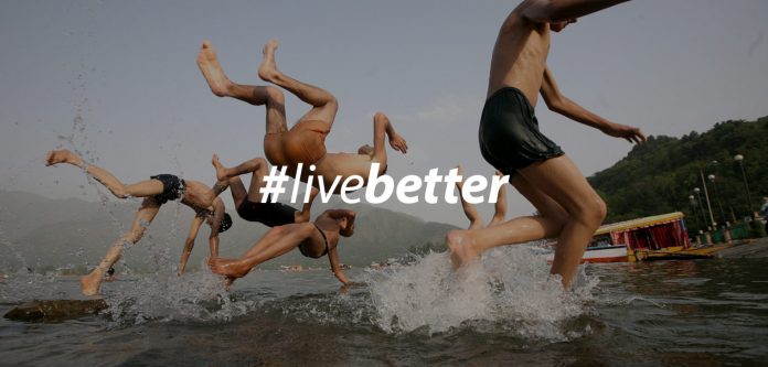 people playing in water with #livebetter logo