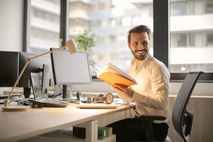 startup tools man at desk utilizing